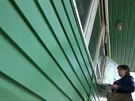 Blowing wind lifts skirt and shows ass