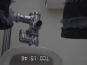 Voyeur hidden in the public toilets