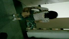 Little Asian lady squating and taking a little piss in a porno vid