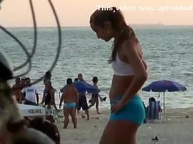 Girls playing volleyball in a tight bikini