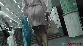 Hotty in light white costume upskirt flash