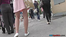 Flabby arse of a slim hottie caught in upskirt video