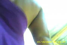 A black brazilian girl wearing a ridiculous short dress...