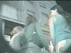 A chubby girl shows her pierced pussy in this upskirt voyeur video