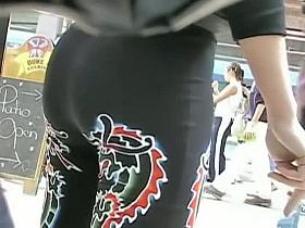 Candid street babe with very tight pants and a round ass