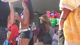 A sexy festival tanned babe gets followed by a skillful voyeur