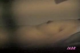 Lesbian babes have fun in voyeur video made through window