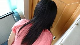 A cute Asian chick really needs to pee.