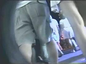 Curvy assed white chick in thong walks in an upskirt public porno