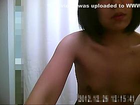 Frisky exotic tart reveals her juicy jugs while trying out