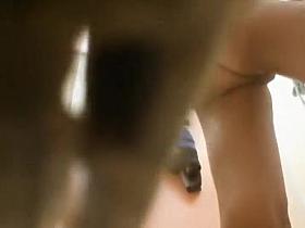 Young babe shaves pussy in the shower