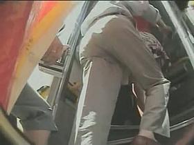 Hidden cam look see up a skirt of a hot mature woman