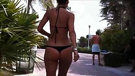 Beautiful girl with small bikini thong !