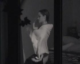 Voyeur window girl drying off