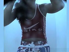 Sporty chick spied in beach cabin changing