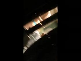 Topless chick in window