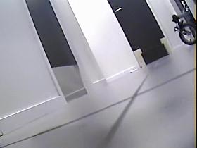 Spy cam in changing room shoots topless babe in jeans