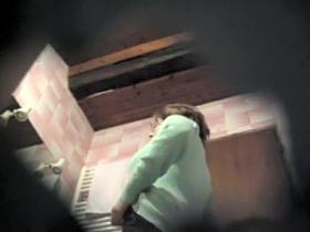 Chubby woman wipes after a shower