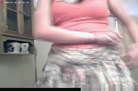 Girl undressing to take a shower