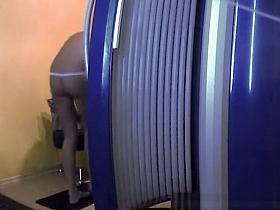 Two girls spied in tanning room