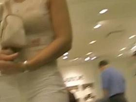 Candid erotic girl walks seductively in her tight pants.