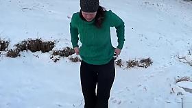 Brave Russian woman swims in the ice-cold water