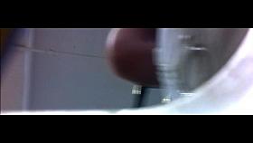 Greek Upskirt 8 Brunette in White Skirt