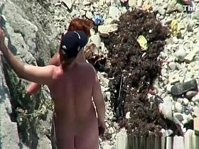 Two nudist women posing for pictures