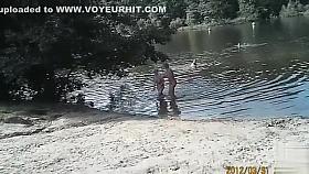 Sunny day at the nudist camp by the river