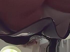 College student in short black dress