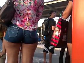 Woman with nice booty in tight shorts