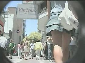 Leggy brunette sweetheart wears no panties in a hot upskirt video