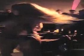 Naughty vixen wearing G-strings and a tank top jiggles her butt