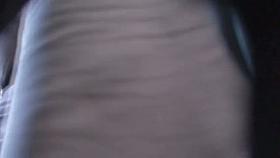 Hot babe in a short white dress exposed by an up skirt voyeur