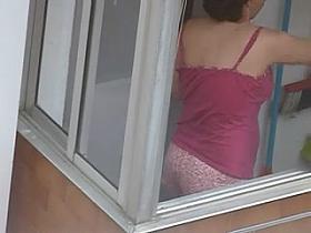 tendiendo ropa voyeur