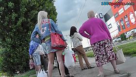 Nice upskirt outdoor scene with blonde in Jeans skirt