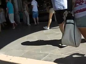 Half of his daughter's ass is visible