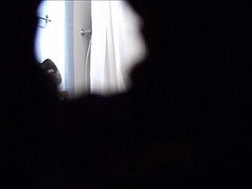 Busty brunette in the shower