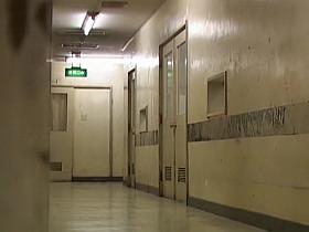 Walking along the corridor nurse got her skirt pulled up