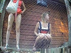 Hidden camera catches two hot chicks pissing