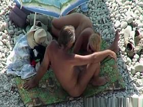 Blonde nudist plays with dick