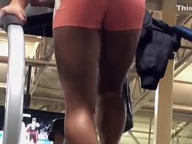 Fit ass of a woman on a treadmill