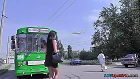 Raven-haired beauty upskirting on the street and stairs