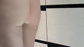 Girl with a hairy pussy showering off