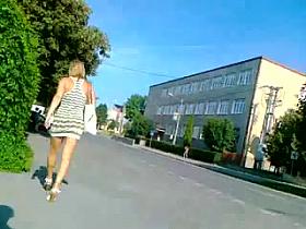 Hot slut in miniskirt caught in street candid video