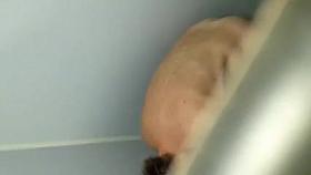 Woman with big nipples changing after swimming