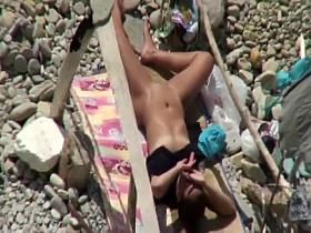 Naked woman is afraid of the sun