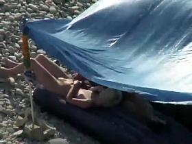 Nudists spied on the beach