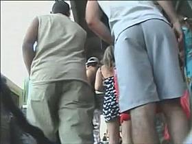 Sexy up very short skirt street shot of a girl's thong