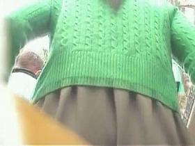 Russian upskirt shot reveals a bare hot ass in the windy weather